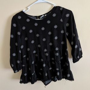 Black pattern top, with tassels